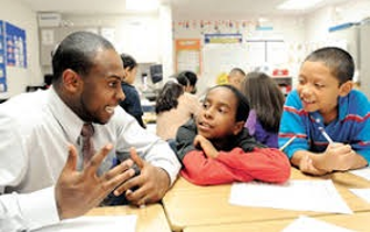 Male teacher with boys